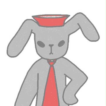 赤い洗面器を頭にのせた うさぎ