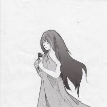 バラを持った女の人