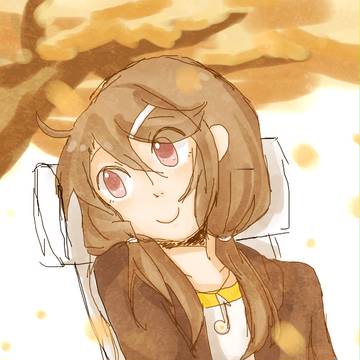 秋の木の下に座って