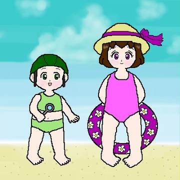 海をバックに…
