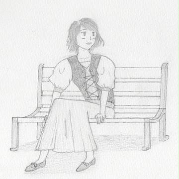 ベンチに座る女性