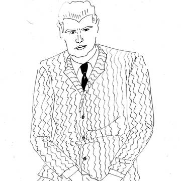 スーツの男