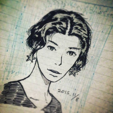 短髪の女