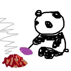 焼き芋をするパンダ