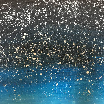 雪が降る空