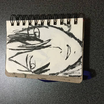 筆ペンでメモ帳に落書き