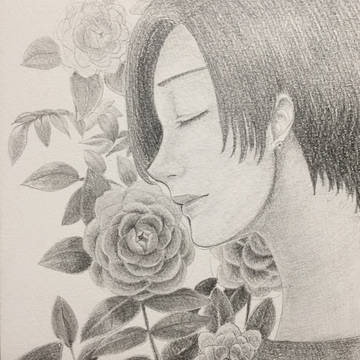 椿と女性