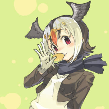 お菓子をパクリとパフィンちゃん