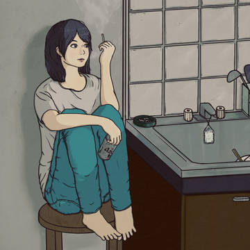 タバコを吸う女の人
