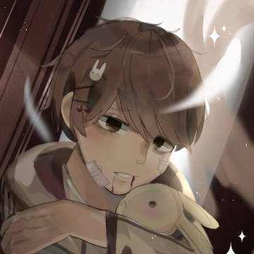 boy holding a bunny doll