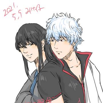 背中を預ける２人