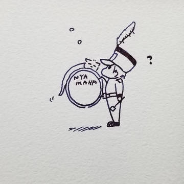 太鼓の上で眠るねこ