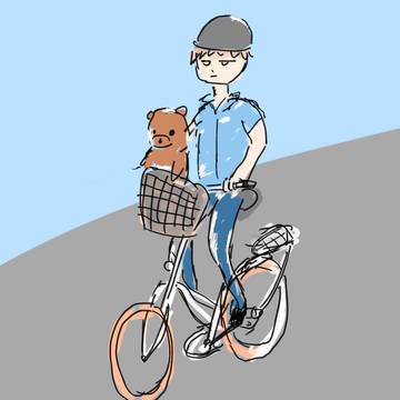 自転車に乗る青年