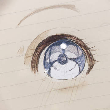 ノートに描いた目