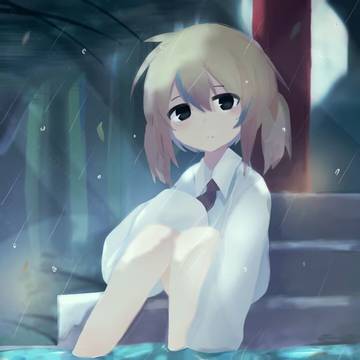 雨の中に座る彼女