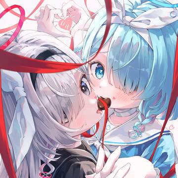 アロナとプラナが仲良くチョコを咥えてくれた
