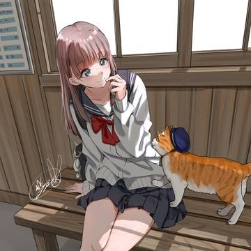 猫の駅長と女の子