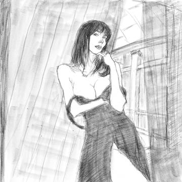 窓辺に佇む女性