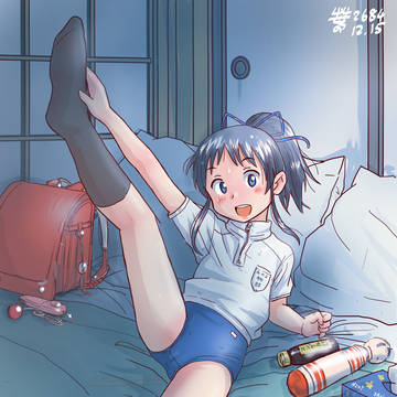 布団の上で復習しようとする娘