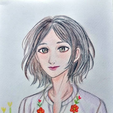 花柄の刺しゅう入りのブラウス