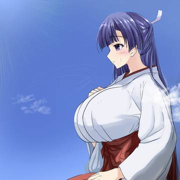 座る巫女さん