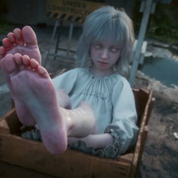Emily's feet in box