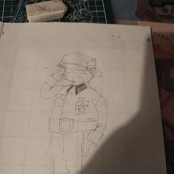 敬礼をしている笑顔の兵士