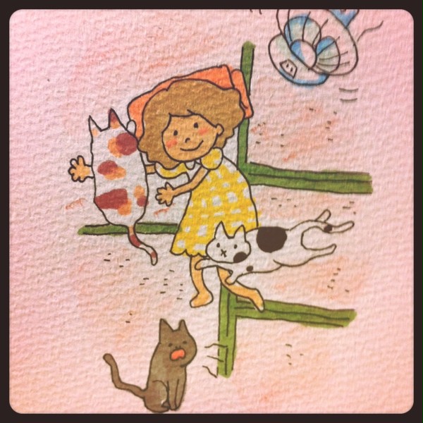 ねこと戯れる少女