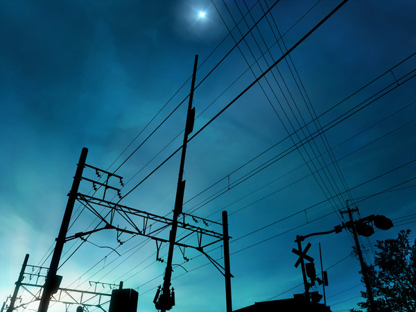 電線と電柱と踏切と