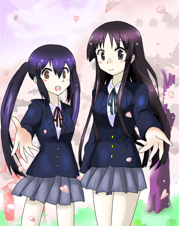 桜 舞 う
