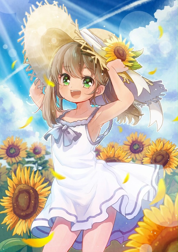 大きな麦わら帽子が似合う女の子