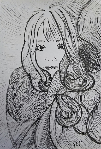 絡む髪