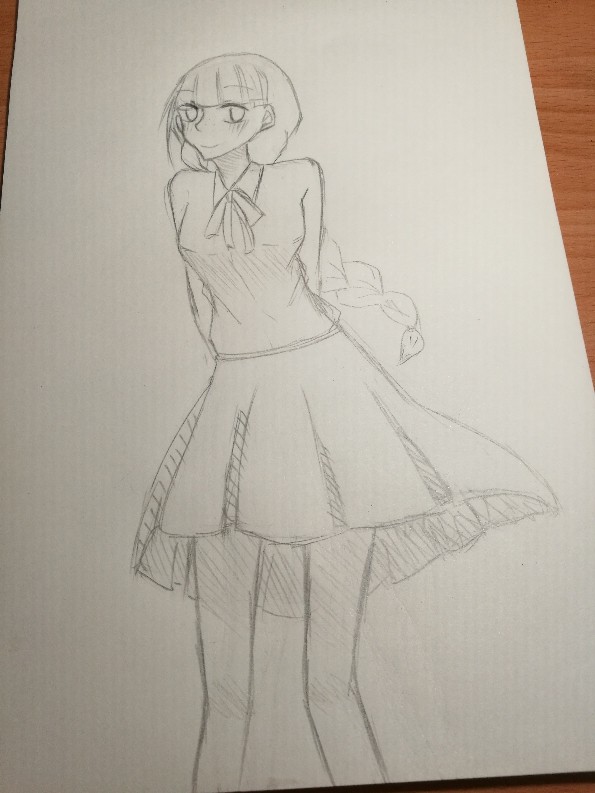 彼女。