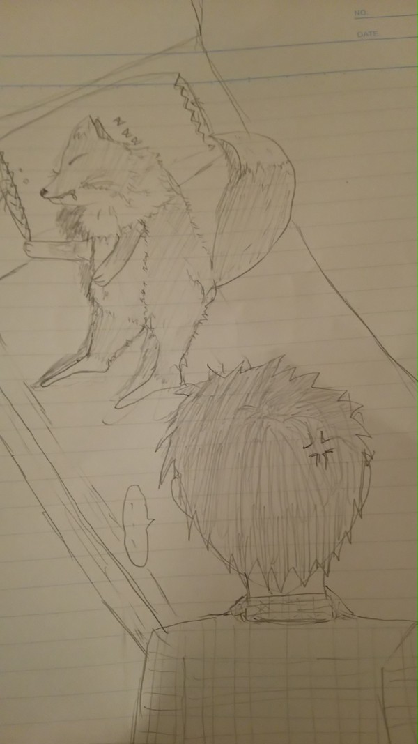 布団を占領する狐