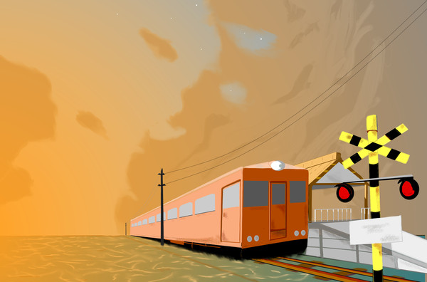 夕焼け雲と海の上の電車