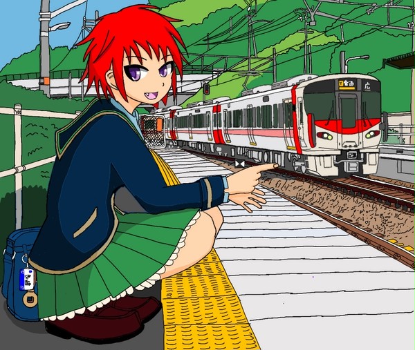 朝、駅で