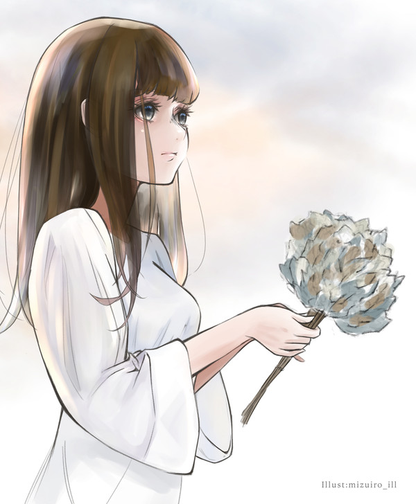 黄昏れる女性