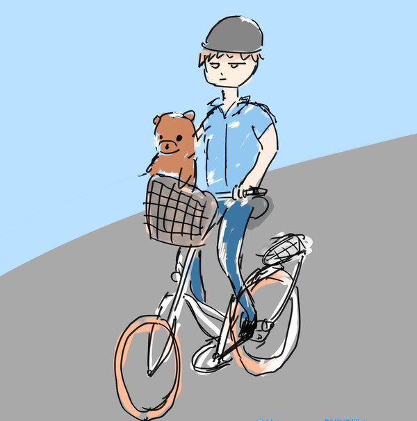 自転車に乗る青年
