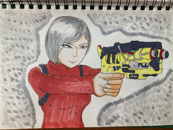 銃を構える人。