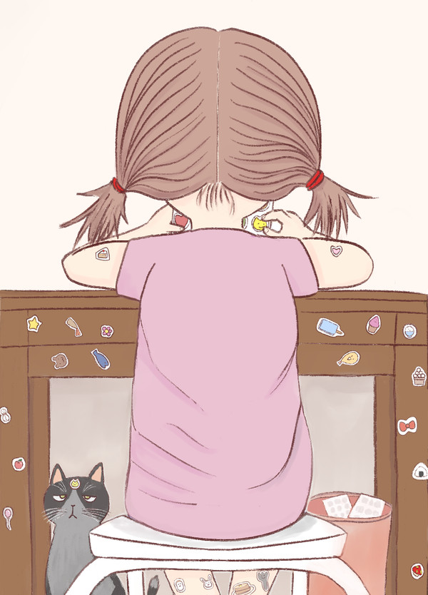 シールで遊ぶ女の子