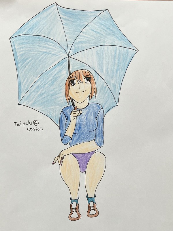 傘をさす