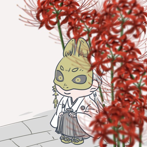ちっこい狐面の男