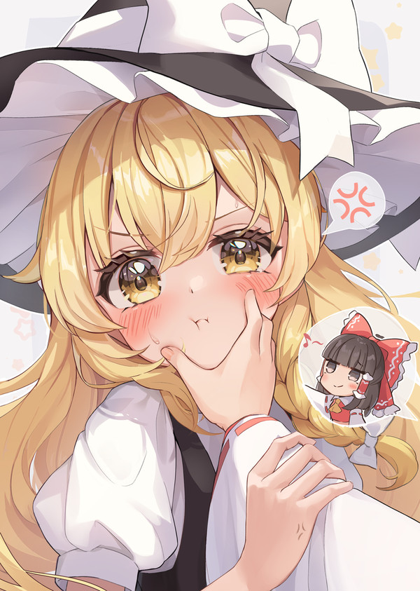 魔理沙のほっぺをぷにっと