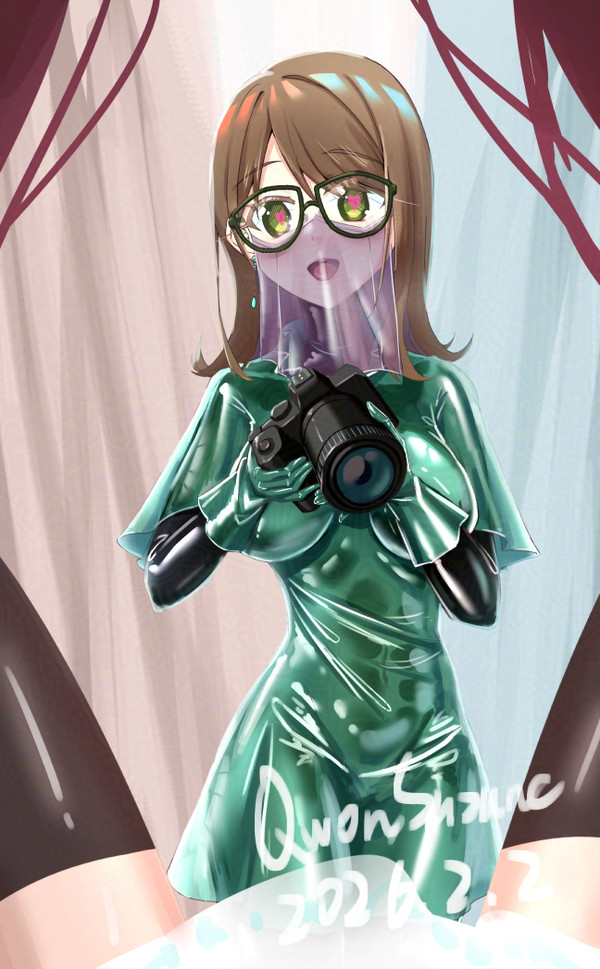 女性カメラマン