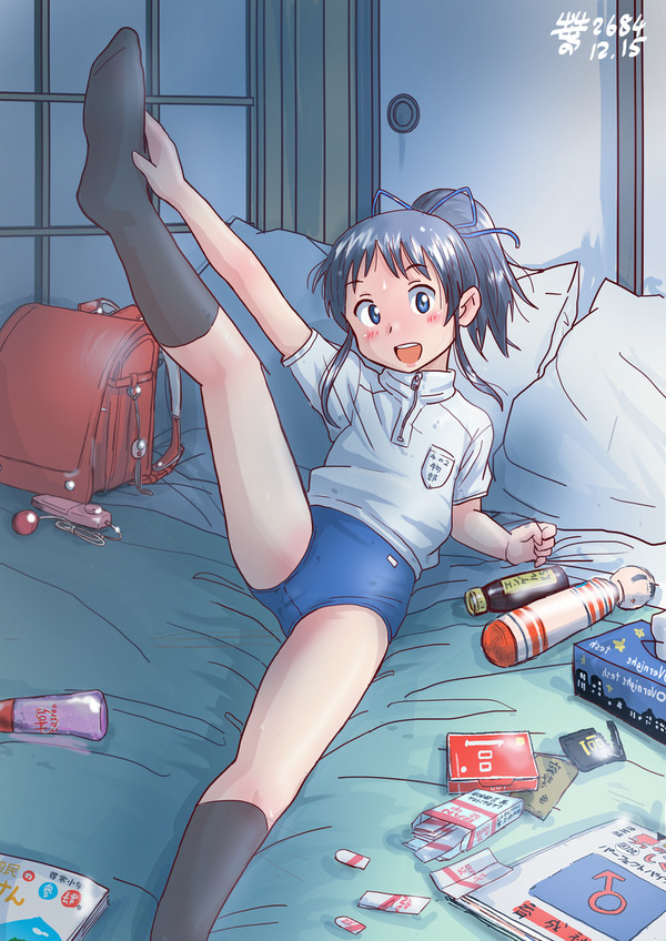布団の上で復習しようとする娘