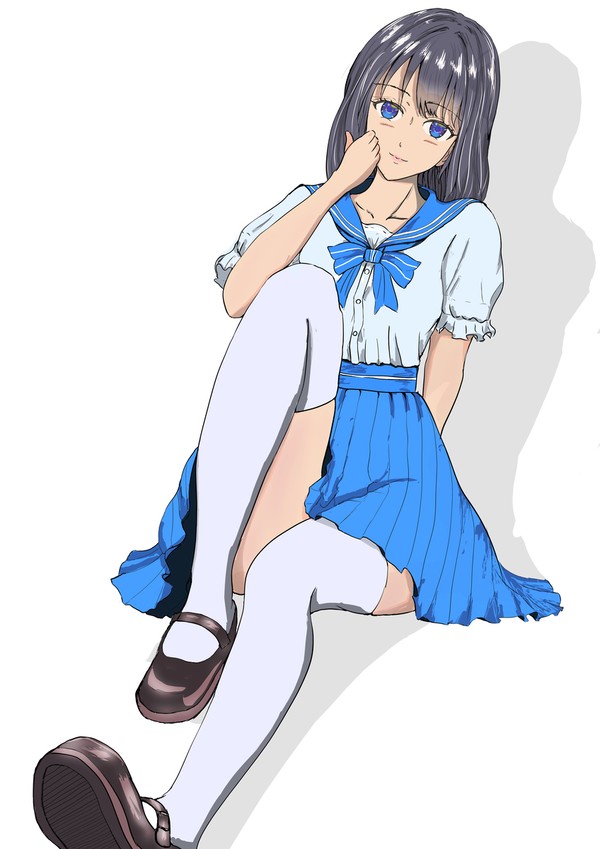 地面に座る女性