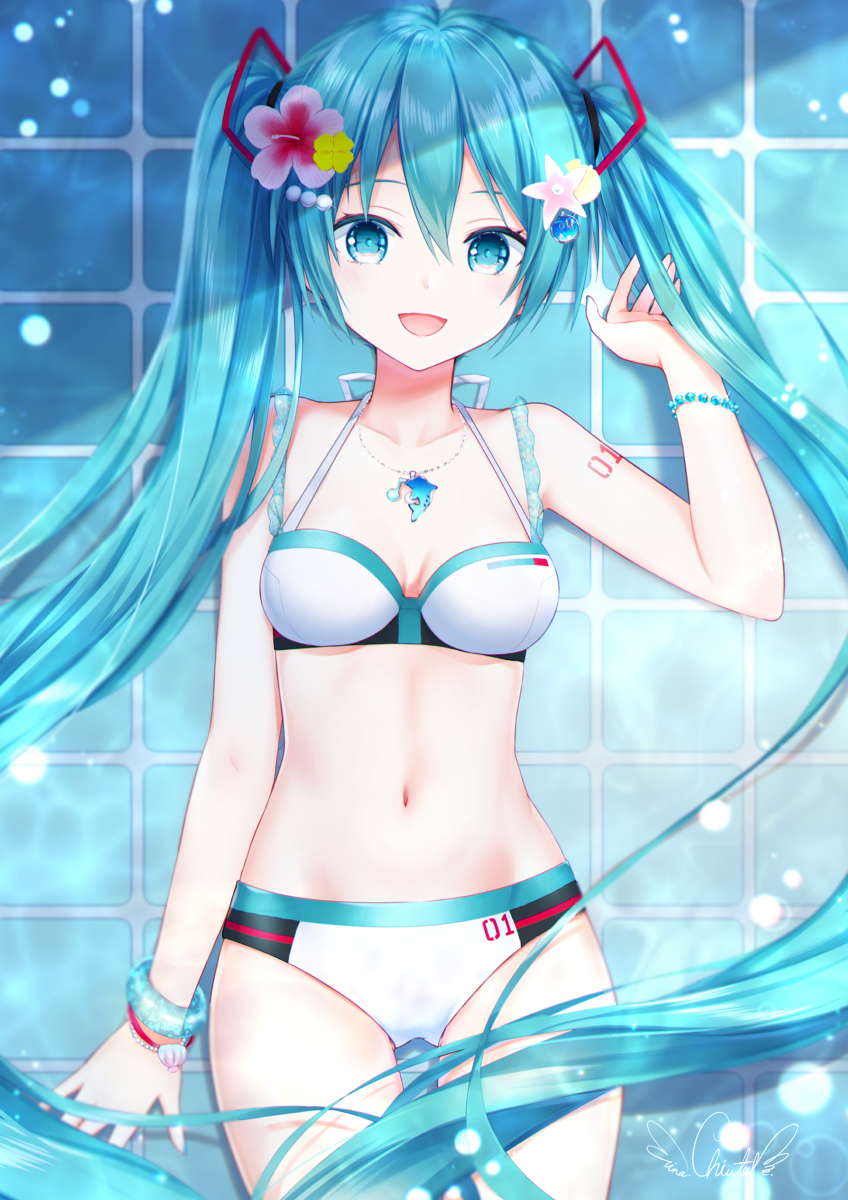 This is a pixiv picture whose title is 水着ミク・o*゜.