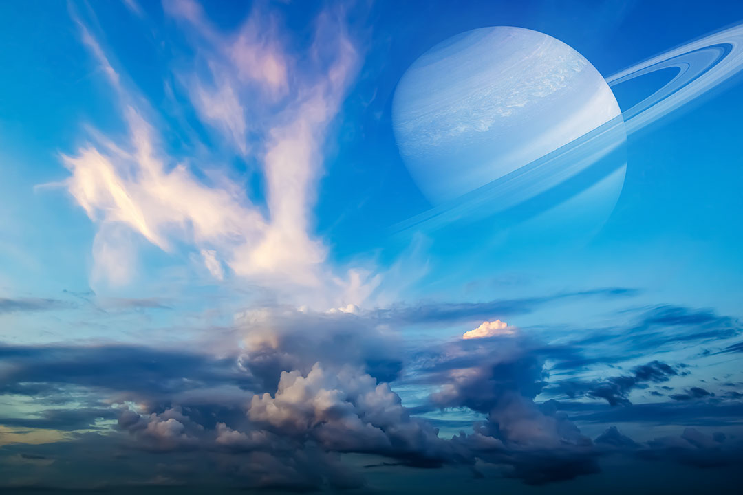 This is a pixiv picture whose title is 雲と土星の幻想.